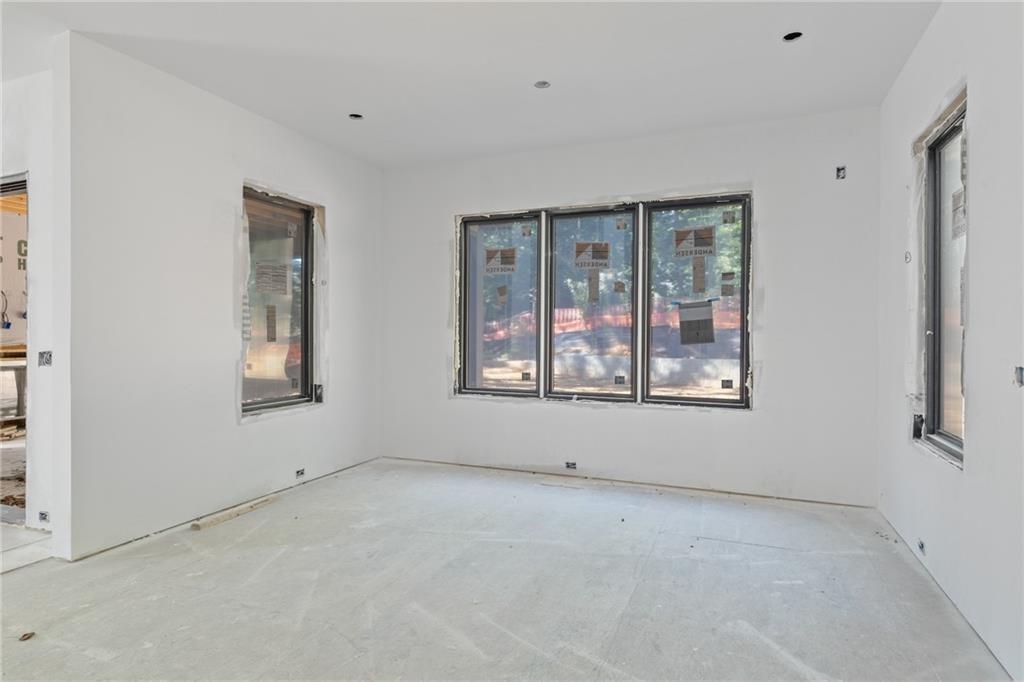 3886 Rains Court Northeast Brookhaven, GA 30319 - Photo 13 of 23 a view of an empty room with a window