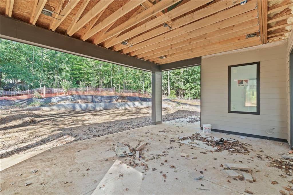 3886 Rains Court Northeast Brookhaven, GA 30319 - Photo 15 of 23 a view of a room with a large window and wooden roof