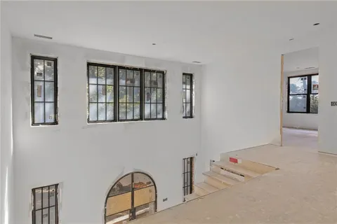 a view of livingroom with furniture and window