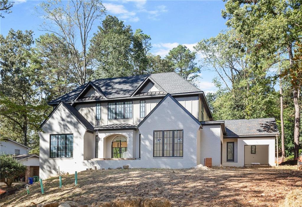 3886 Rains Court Northeast Brookhaven, GA 30319 - Photo 3 of 23 front view of a house with a yard