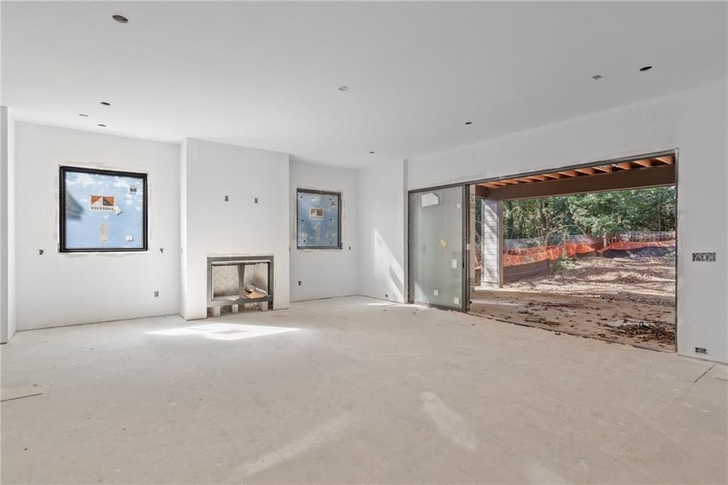 3886 Rains Court Northeast Brookhaven, GA 30319 - Photo 10 of 23 a view of a livingroom with an empty space and a window
