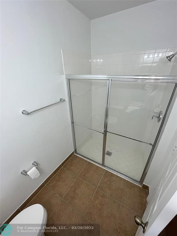 9704 Windrift Circle Fort Pierce, FL 34945 - Photo 12 of 21 a bathroom with a shower