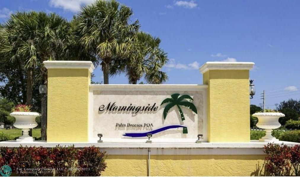 9704 Windrift Circle Fort Pierce, FL 34945 - Photo 21 of 21 a view of swimming pool with outdoor seating