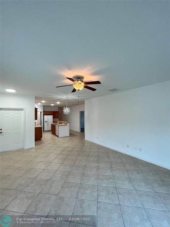 9704 Windrift Circle Fort Pierce, FL 34945 - Photo 5 of 21 a view of a storage & utility room