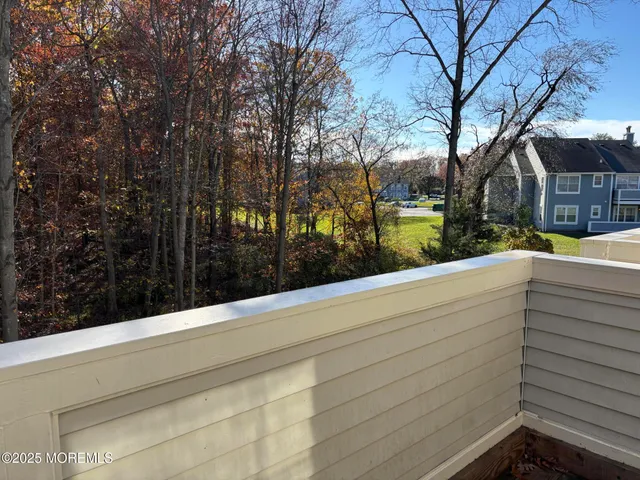 a view of swimming pool with a bench