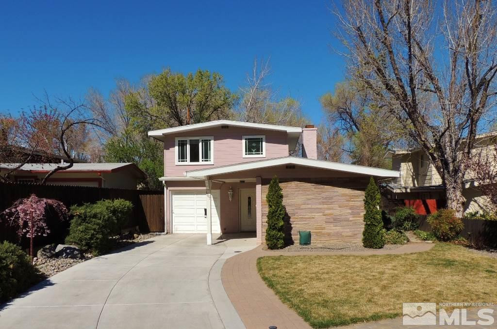 1007 Mt Rose Street Reno, NV 89509 - Photo 1 of 1 a front view of a house with a yard