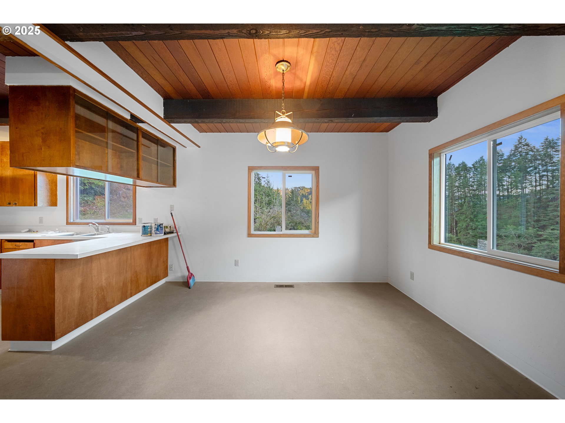 604 Thorton Oar Lane Reedsport, OR 97467 - Photo 13 of 47 a view of an empty room with a window