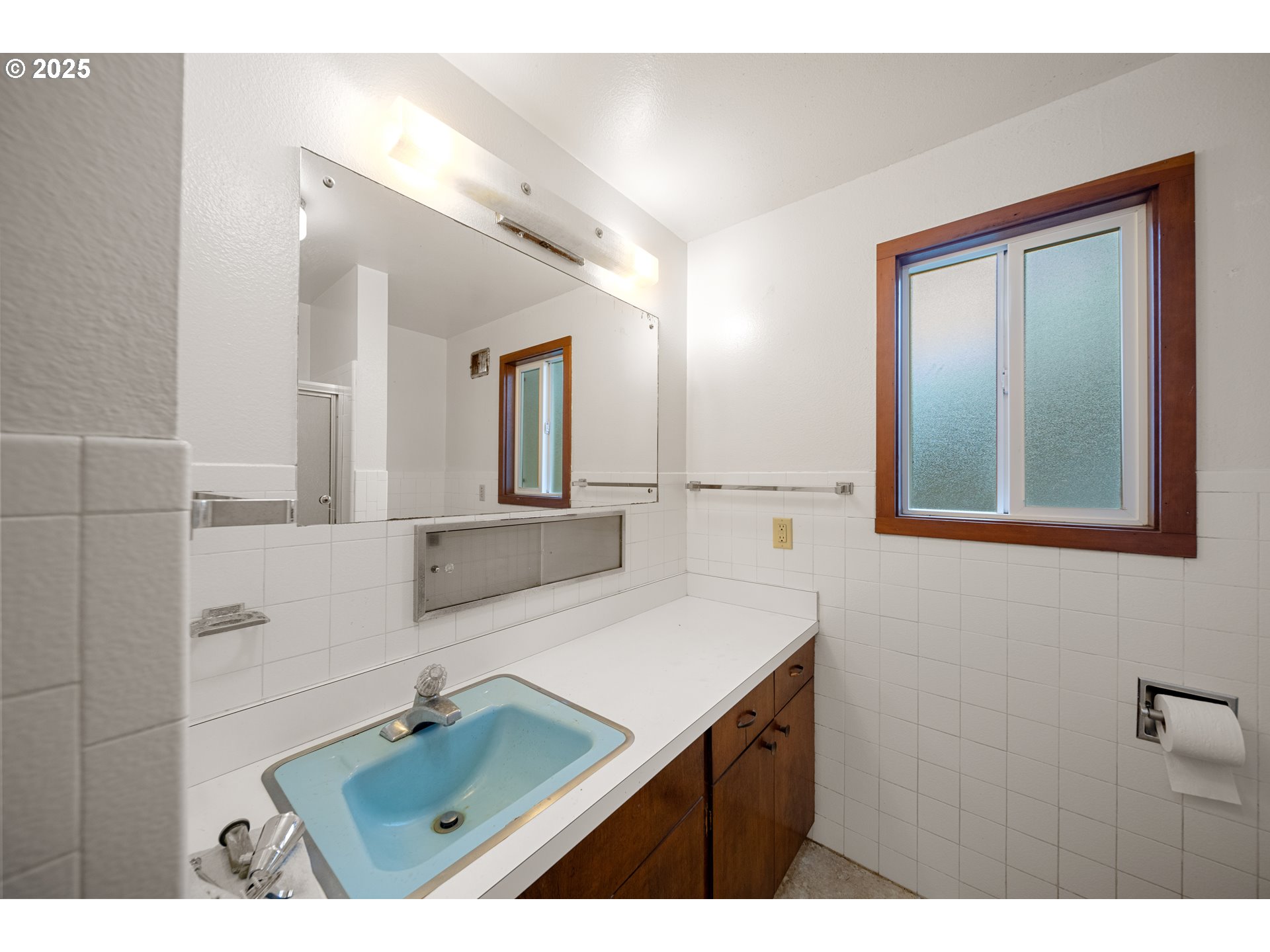 604 Thorton Oar Lane Reedsport, OR 97467 - Photo 30 of 47 a bathroom with a sink vanity and mirror