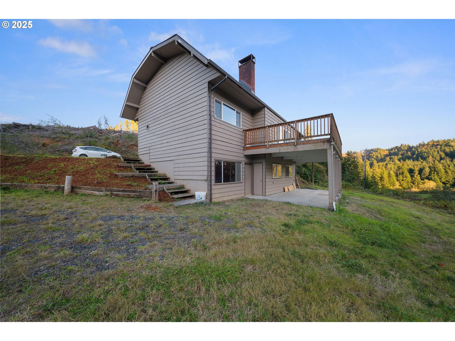 604 Thorton Oar Lane Reedsport, OR 97467 - Photo 42 of 47 a view of a house with a yard
