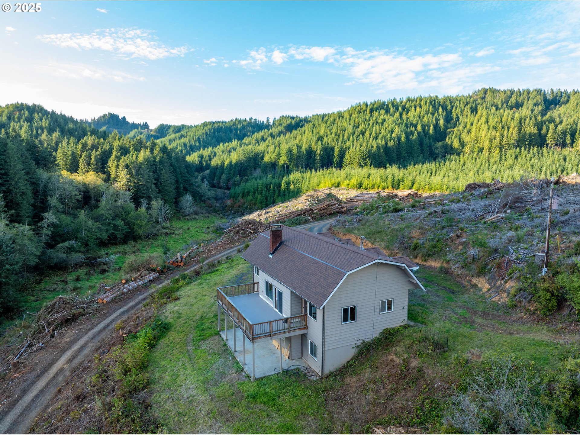 604 Thorton Oar Lane Reedsport, OR 97467 - Photo 47 of 47 a view of a house with a yard