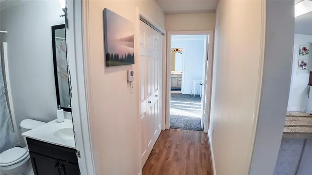 a view of a bedroom with furniture window and front door