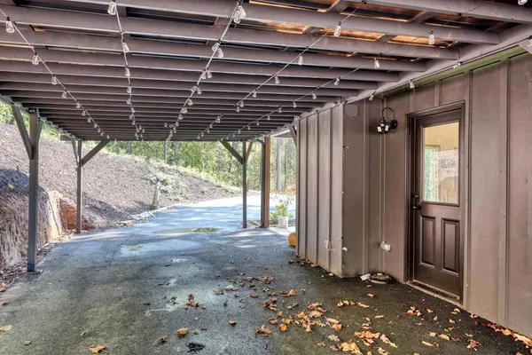 a view of porch with a ceiling fan