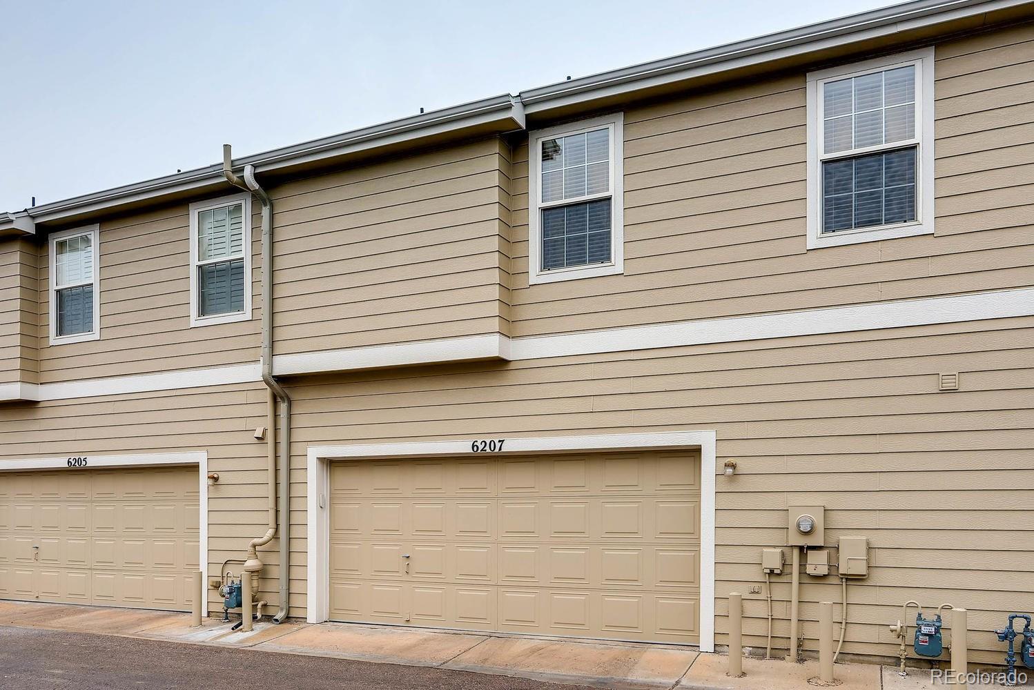 6207 Trailhead Road Highlands Ranch, CO 80130 - Photo 27 of 28 a side view of a house