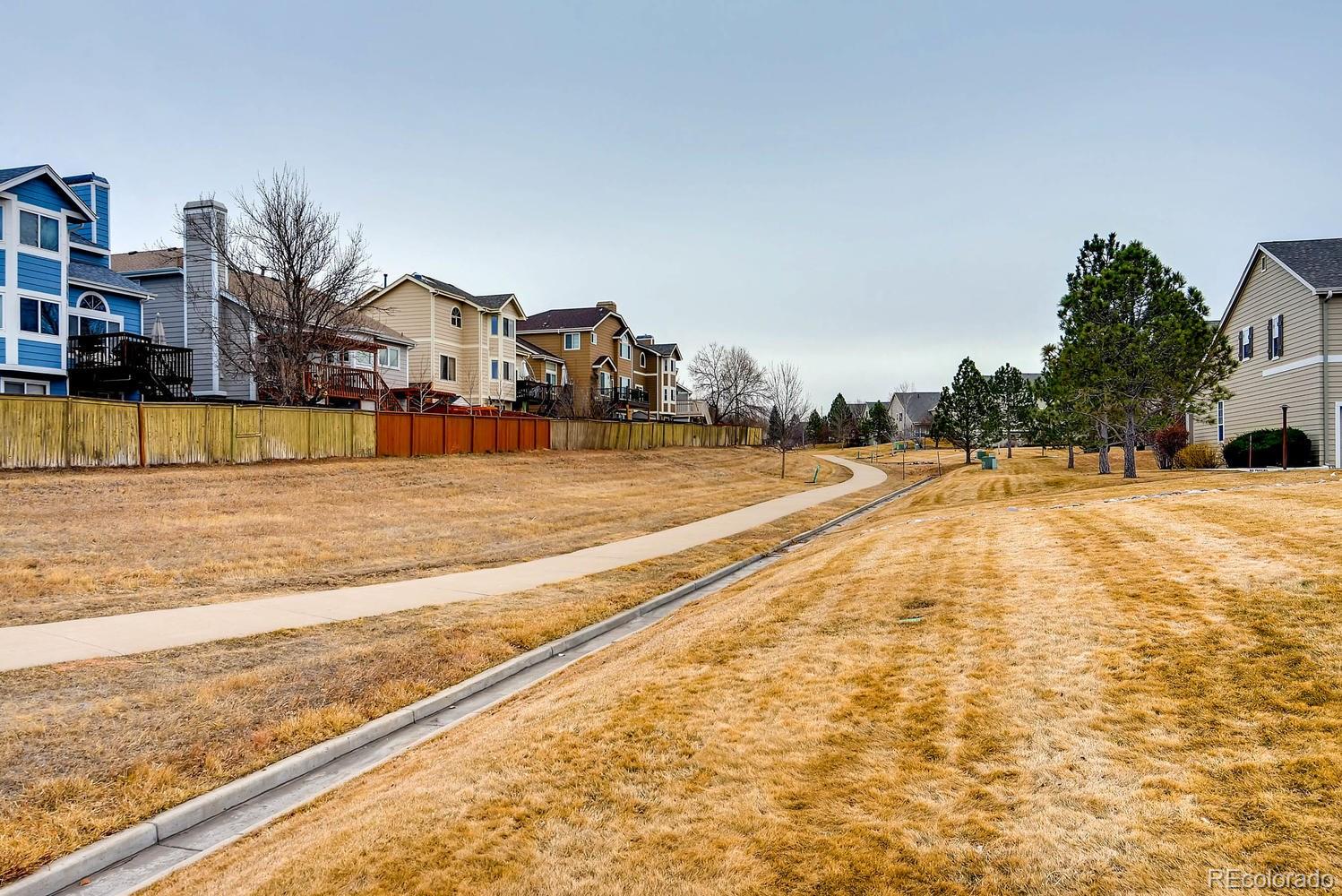 6207 Trailhead Road Highlands Ranch, CO 80130 - Photo 28 of 28 a view of swimming pool with outdoor seating