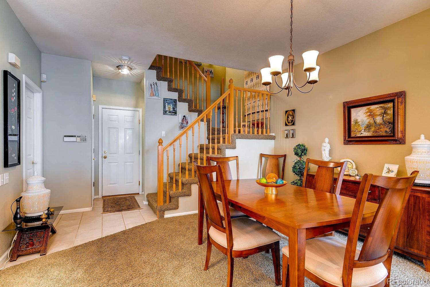 6207 Trailhead Road Highlands Ranch, CO 80130 - Photo 8 of 28 a view of a dining room with furniture