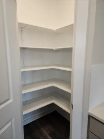 a storage room with an empty racks