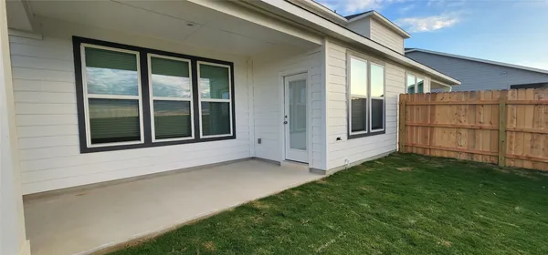 a view of backyard with cabin