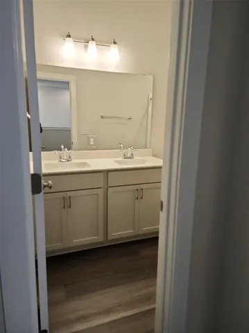 a bathroom with a shower and a toilet