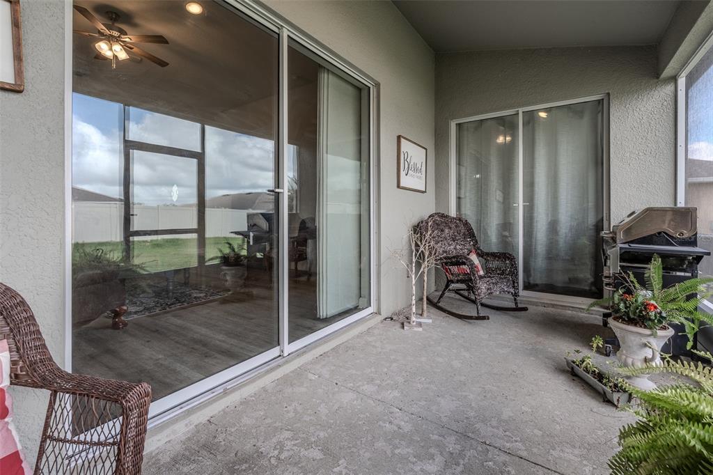 9224 Southwest 60th Ct Road Ocala, FL 34476 - Photo 20 of 55 a room with gym equipment and a large window