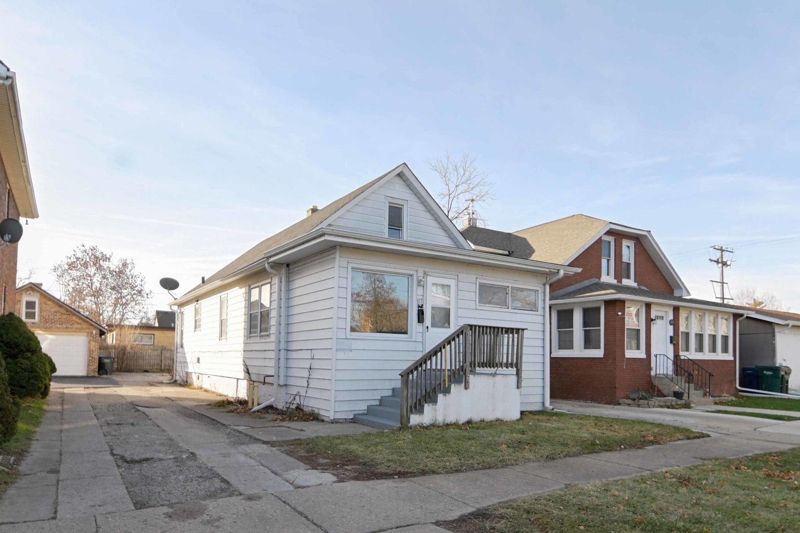 817 11th Street North Chicago, IL 60064 - Photo 1 of 45 a front view of a house with a yard