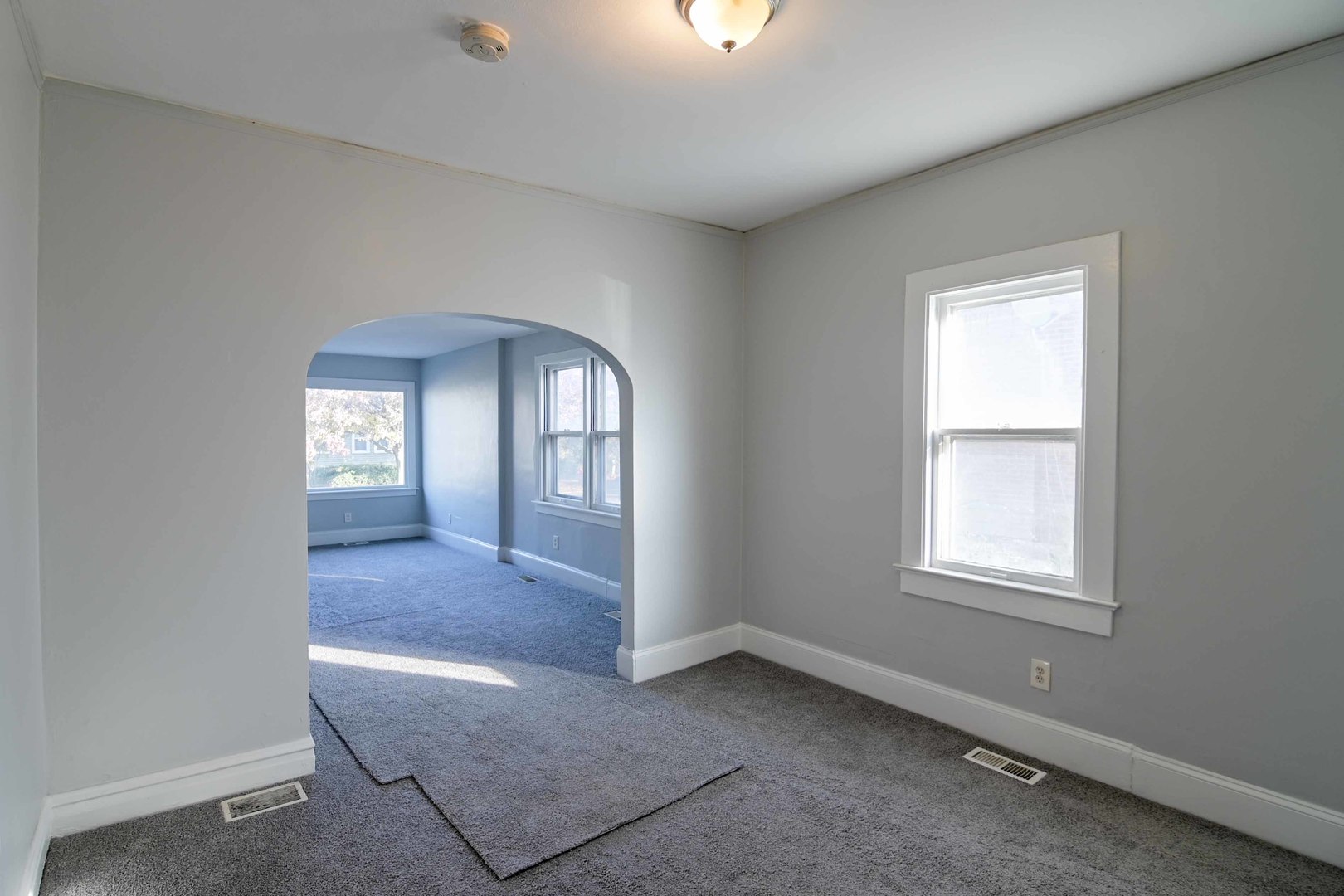 817 11th Street North Chicago, IL 60064 - Photo 12 of 45 an empty room with windows