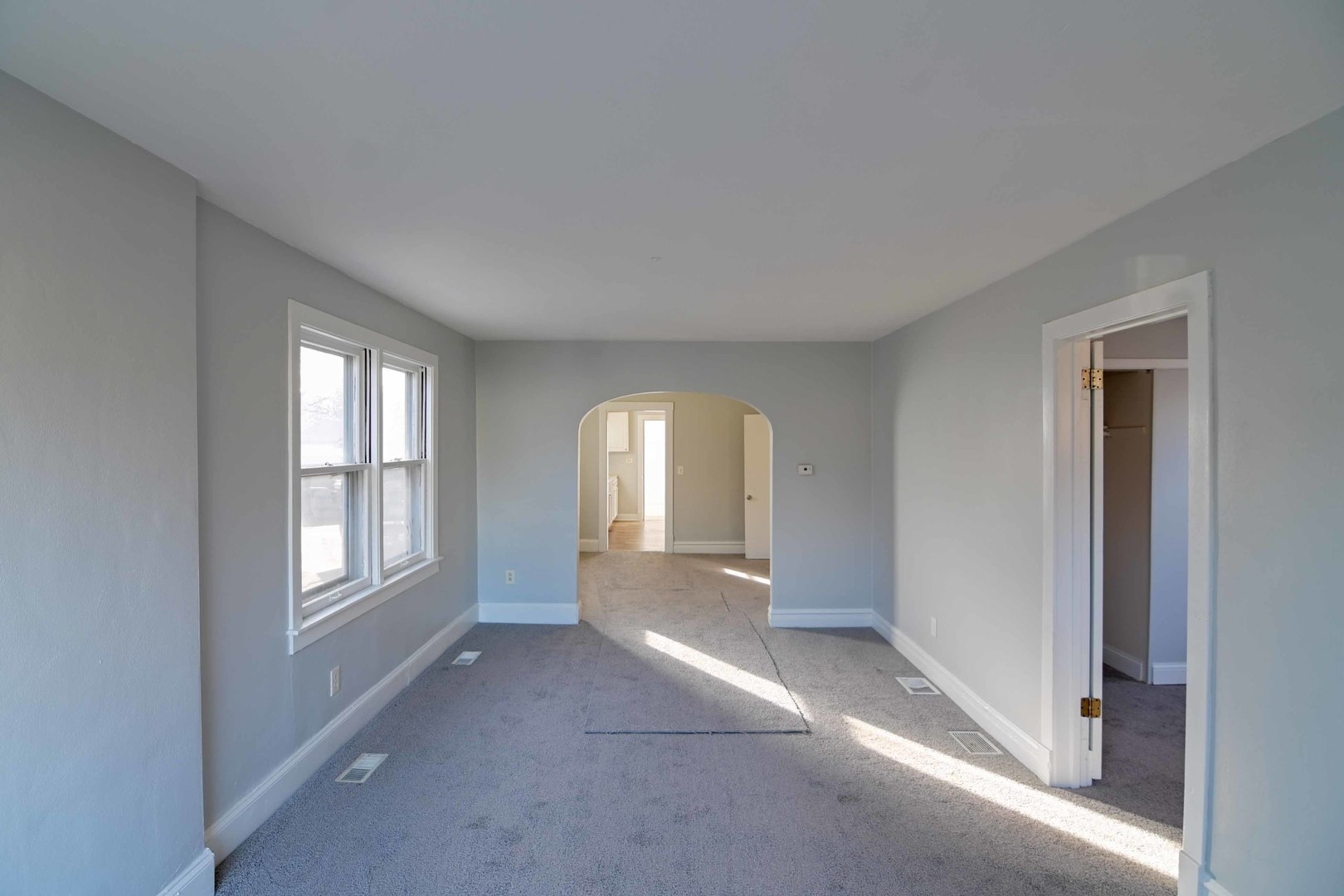 817 11th Street North Chicago, IL 60064 - Photo 3 of 45 a view of a livingroom with a staircase