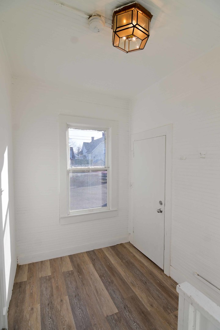 817 11th Street North Chicago, IL 60064 - Photo 31 of 45 an empty room with window