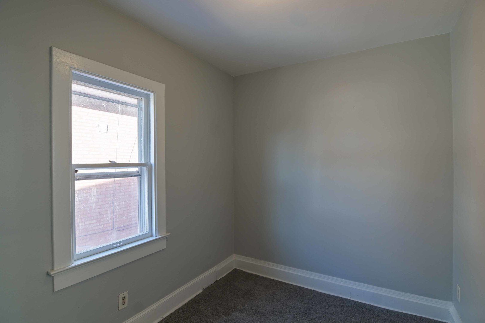817 11th Street North Chicago, IL 60064 - Photo 32 of 45 a view of an empty room and window