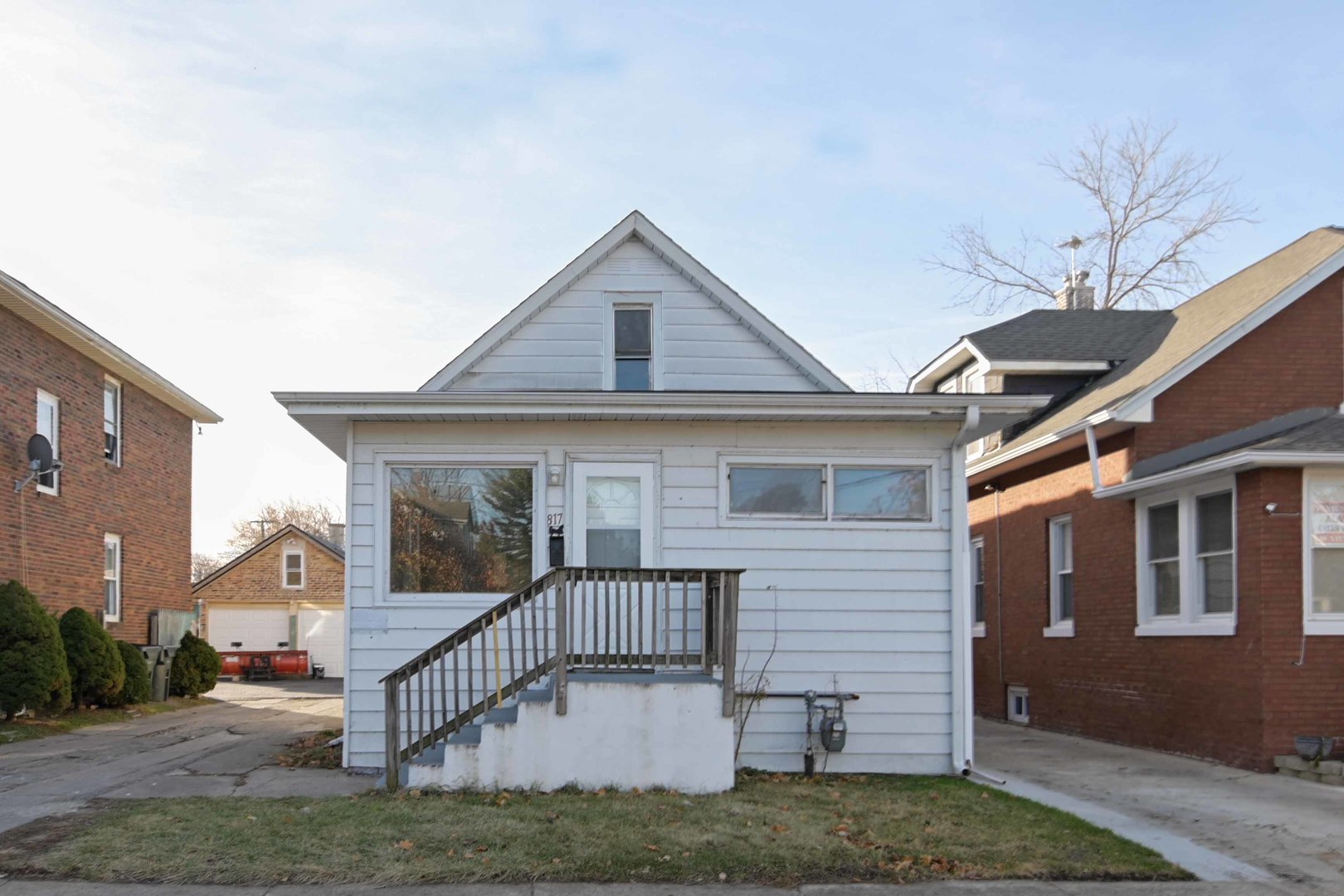 817 11th Street North Chicago, IL 60064 - Photo 38 of 45 a front view of a house with a yard