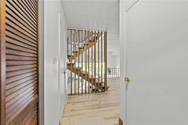 a view of a staircase and door