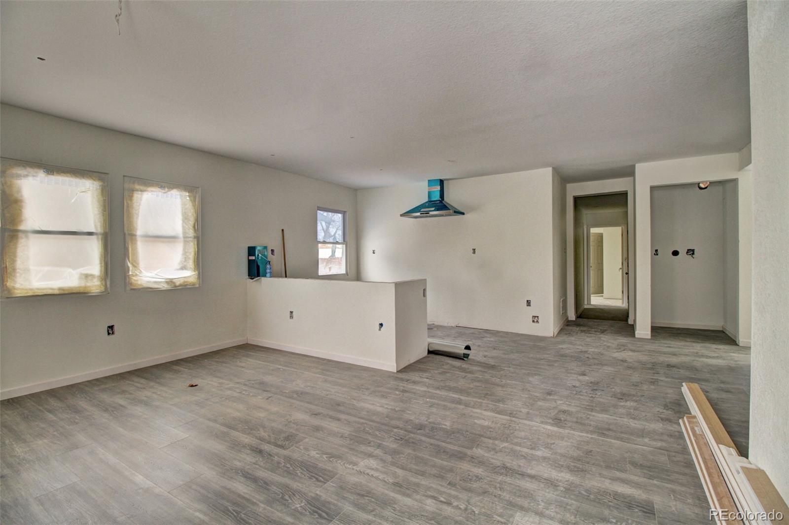 10 South Irving Street Denver, CO 80219 - Photo 2 of 10 a view of empty room with window