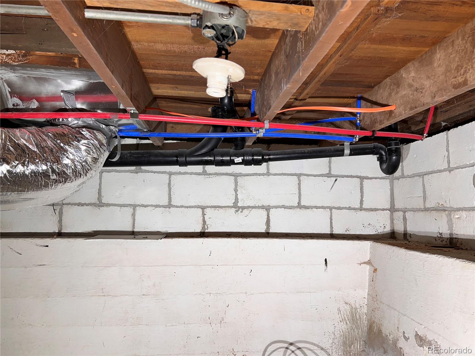 10 South Irving Street Denver, CO 80219 - Photo 8 of 10 a bathroom with a tub sink and mirror