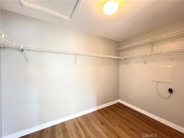 a view of a room with racks on the wall