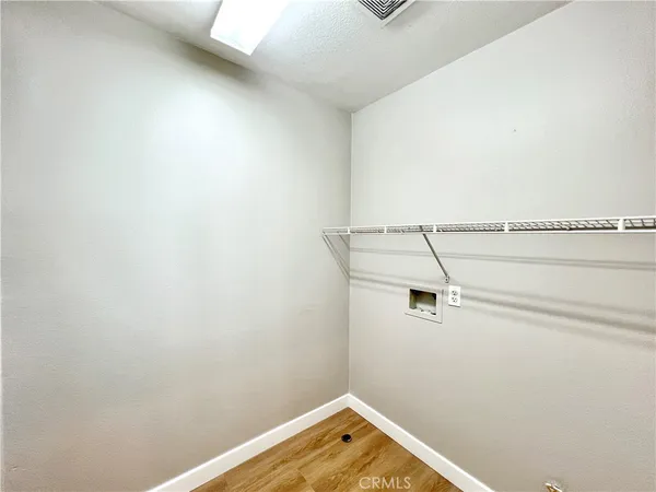 a view of a room with racks on the wall