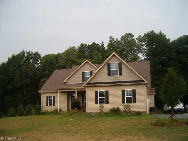 2756 Beckerdite Road Sophia, NC 27350 - Photo 1 of 6 Exterior Front. front view of home, walkway and porch floor is stamped concrete