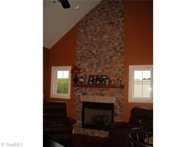 2756 Beckerdite Road Sophia, NC 27350 - Photo 5 of 6 Kitchen. Keeping room with cultured stone fireplace