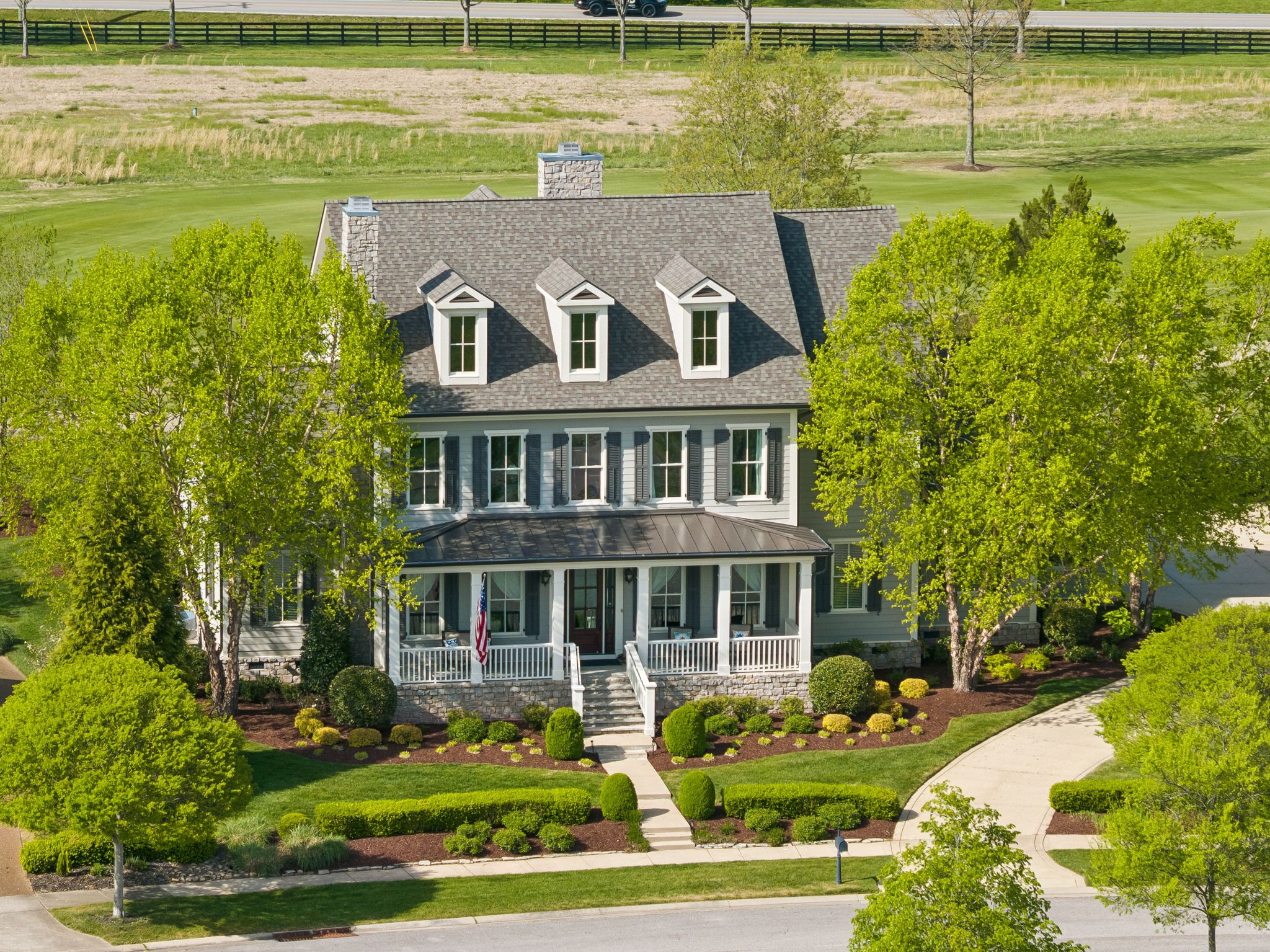 6033 Native Pony Trail College Grove, TN 37046 - Photo 76 of 87 a front view of a house with a swimming pool