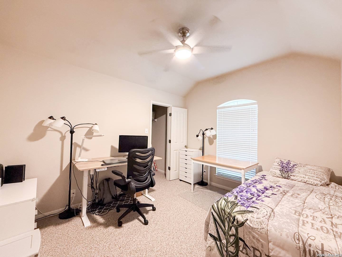 13715 Jubilee Way Helotes, TX 78023 - Photo 26 of 34 a bedroom with a bed and furniture