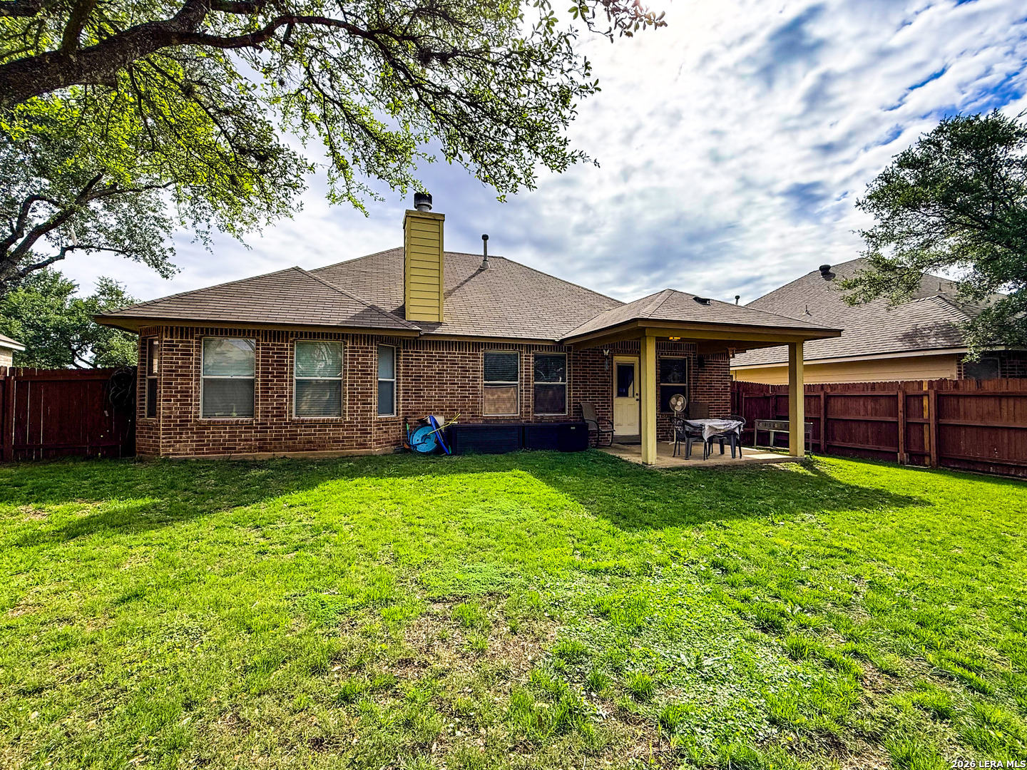 13715 Jubilee Way Helotes, TX 78023 - Photo 31 of 34 a front view of a house with garden