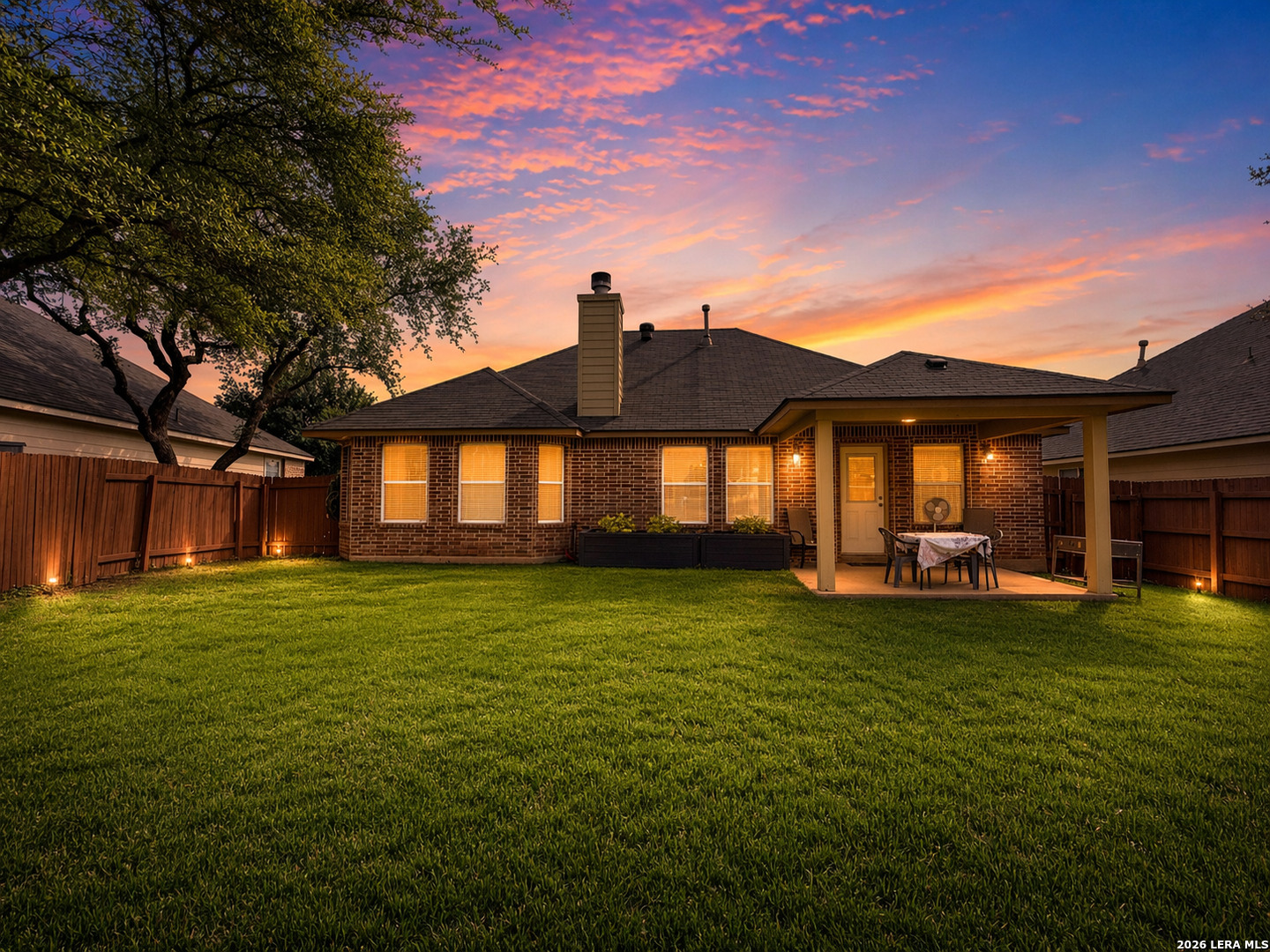 13715 Jubilee Way Helotes, TX 78023 - Photo 34 of 34 a view of a house with a big yard