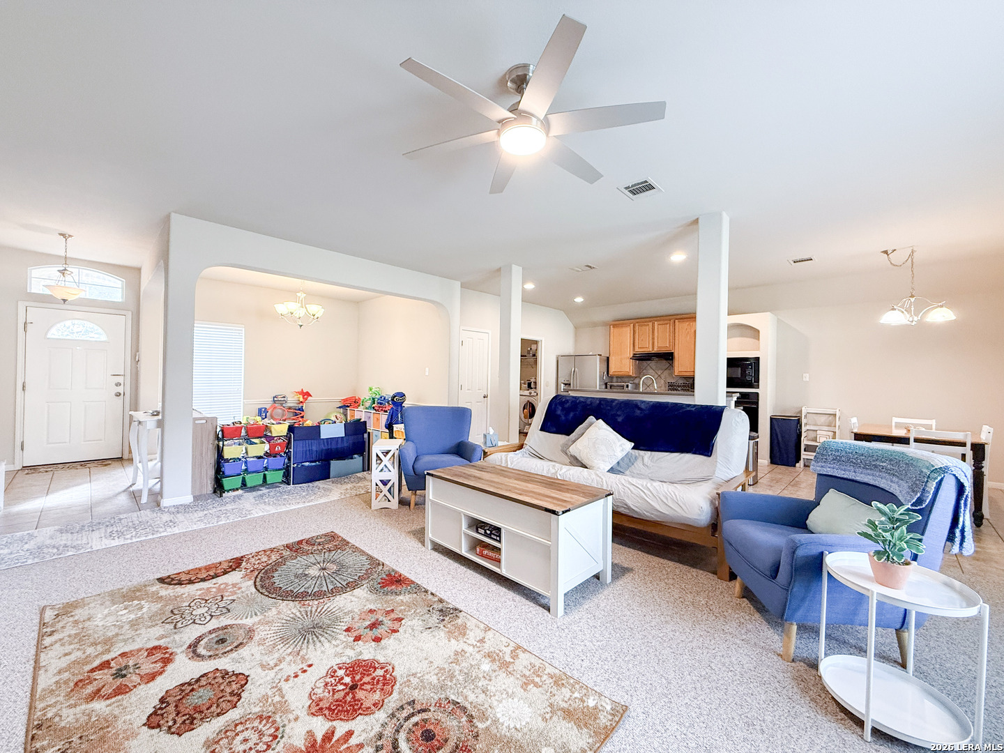 13715 Jubilee Way Helotes, TX 78023 - Photo 10 of 34 a living room with furniture and wooden floor