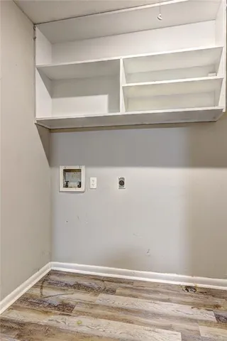 a view of a room that has a window in it