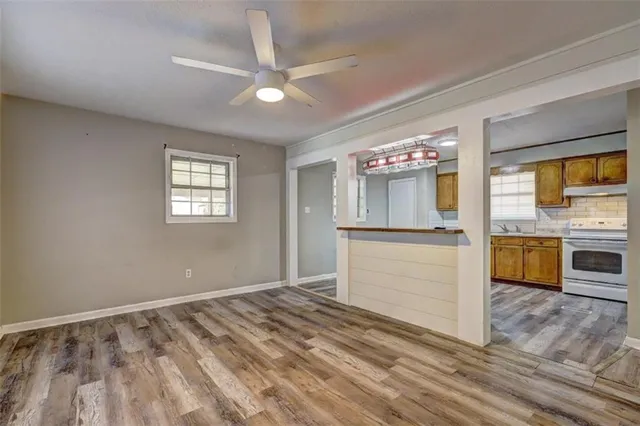 a view of a kitchen with microwave and stove