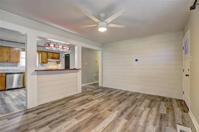 a view of an empty room and window