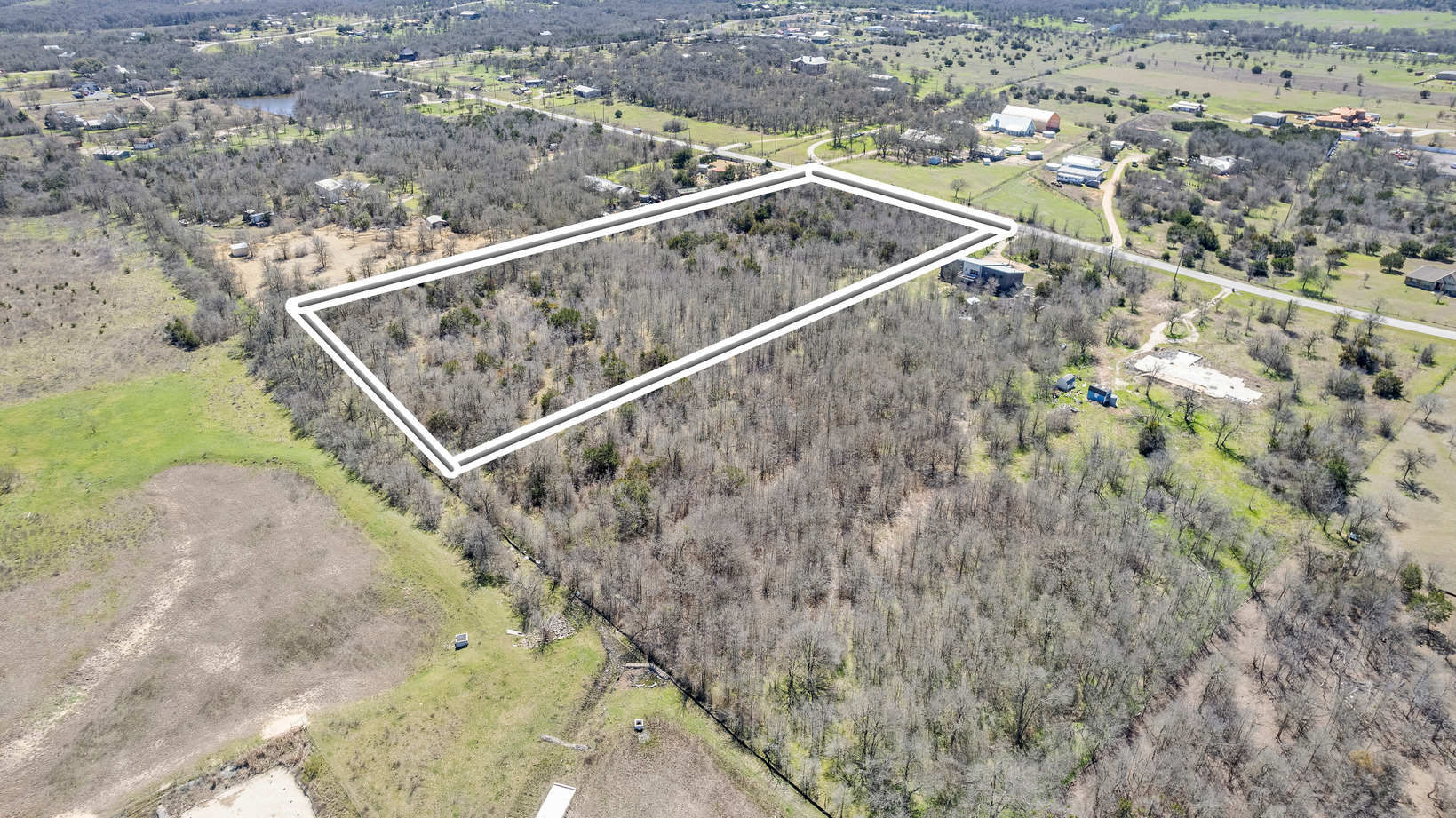 7669 Nez Perce Trace Manor, TX 78653 - Photo 6 of 14 Drone / aerial view featuring a rural view