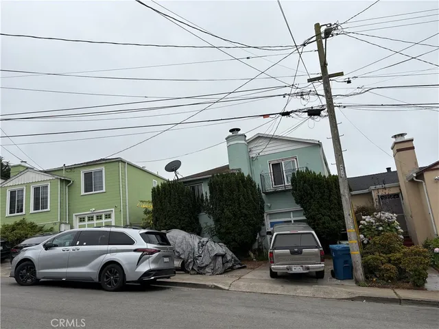 a car parked in front of a house