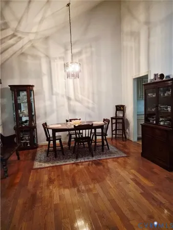 a view of a livingroom with furniture and a stove