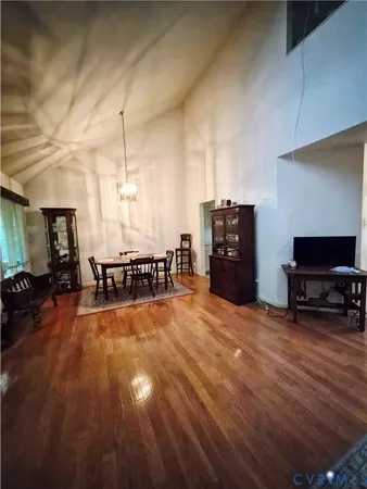 a dining room with table and chair