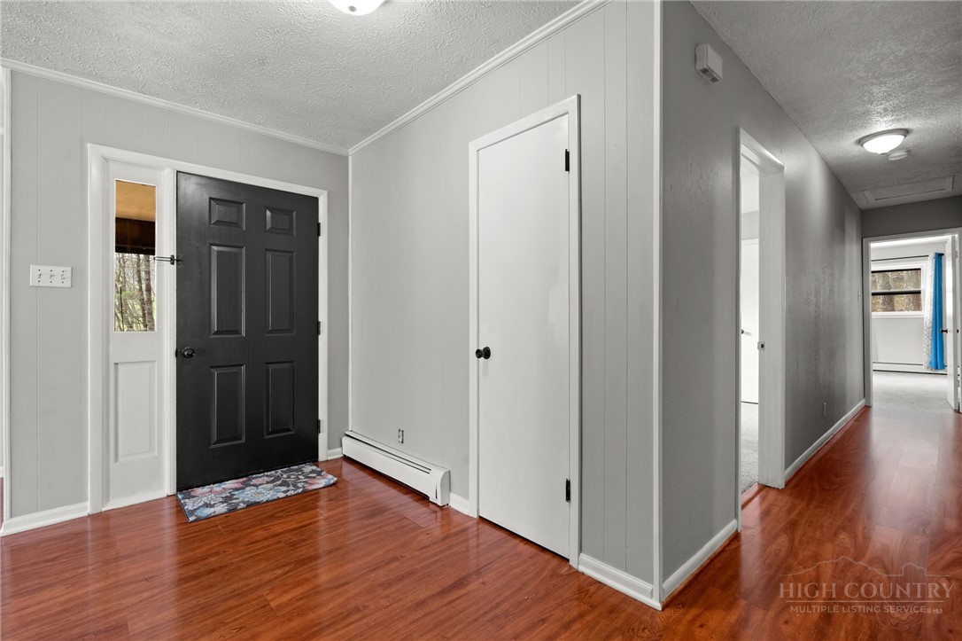 2345 Watauga River Road Sugar Grove, NC 28679 - Photo 13 of 50 a view of an empty room with wooden floor