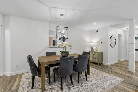 a view of a dining room with furniture
